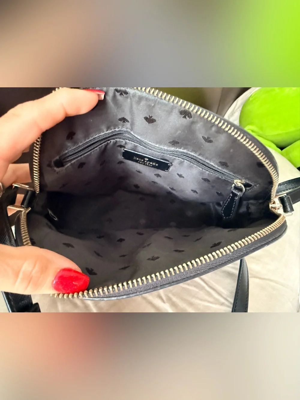 Kate Spade New York Payton Dome Crossbody in black saffiano leather.